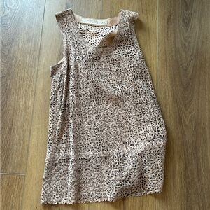 Laser cut leather tunic